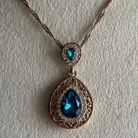 Faceted Blue and Gold Teardrop Pendant Necklace on Twisted Chain - Picture 2 of 16